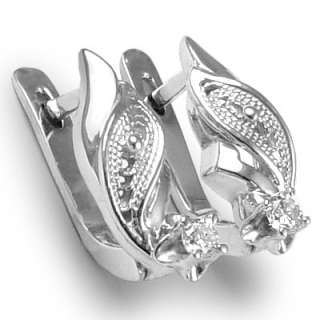 Imperial and elegant. These solid 14k white gold earrings are created 