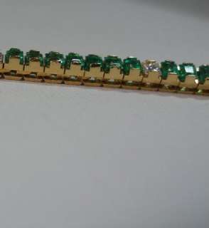 18k yellow gold kelly green emerald and diamond tennis bracelet