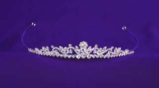   made of crystal clear rhinestones on flower figures. It is nickel and