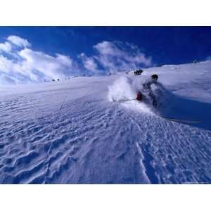 com Skier Descending in Powder Snow, St. Anton Am Arlberg, Vorarlberg 