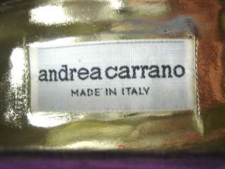   inset on the heels made in italy the designer is andrea carrano these