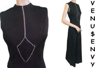 This 60s jumpsuit features huge palazzo legs with a 38 inch 