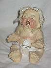 japan figurine baby crying  