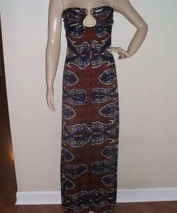 elasticized top trim cut out at center bust with painted metal snake 