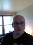 Self photo with a camera phone. Behold my hairlessness