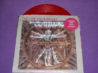 Triumph Follow Your Heart / Stranger In A Strange Land Red Vinyl 45 
