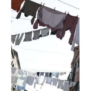  Laundry Hanging from Clotheslines Between Apartment 