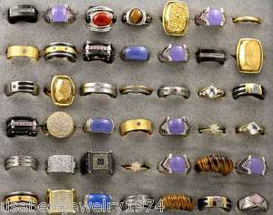   42 ASSORTED RINGS MADE IN 14K GOLD AND 925 Silver Titanium Steel Alloy