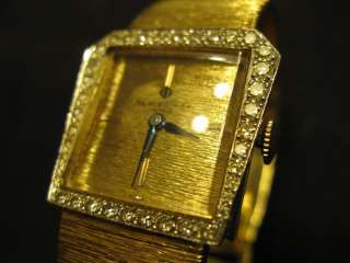   BAUME + MERCIER 14K YELLOW GOLD + DIAMOND BEZEL WRIST WATCH  