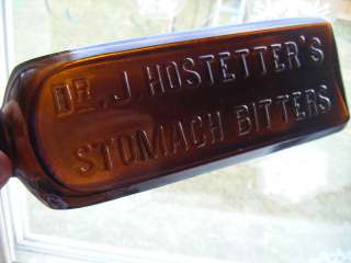 old emb. bitters Dr hostetters stomach bitters amber  