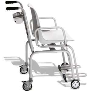 Electronic chair scale with four wheels, swivelling arm rests and fold 