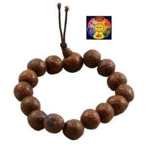 Bodhi Seed Wrist Mala  11 Mm and a Free Copyrighted Tibetan Buddha Eye 