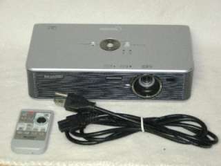 Sharp XR 1S DLP Mini Portable Projector with remote & cord. Needs Lamp 